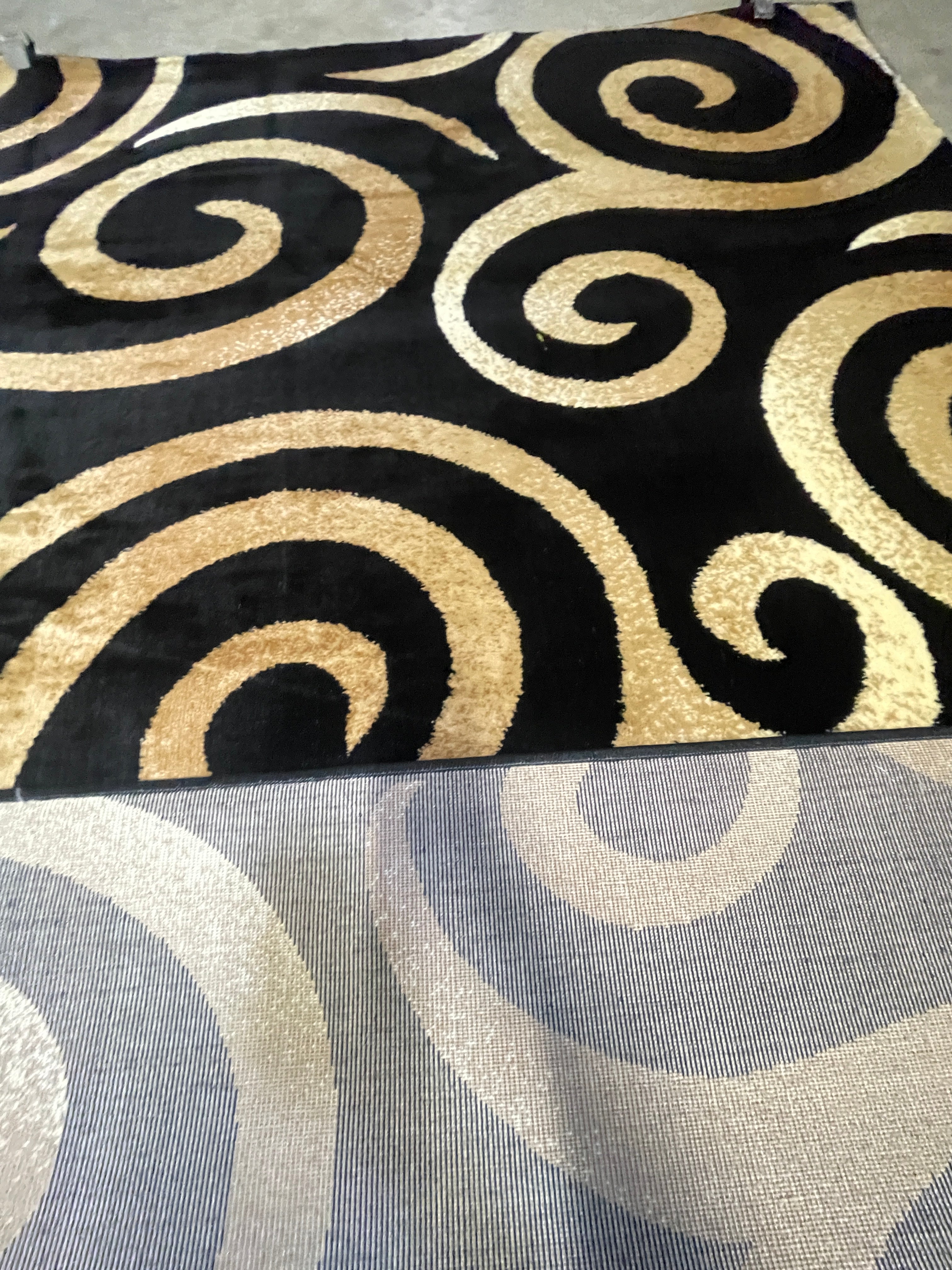 Black and Gold Swirls Festival Collection Area Rug