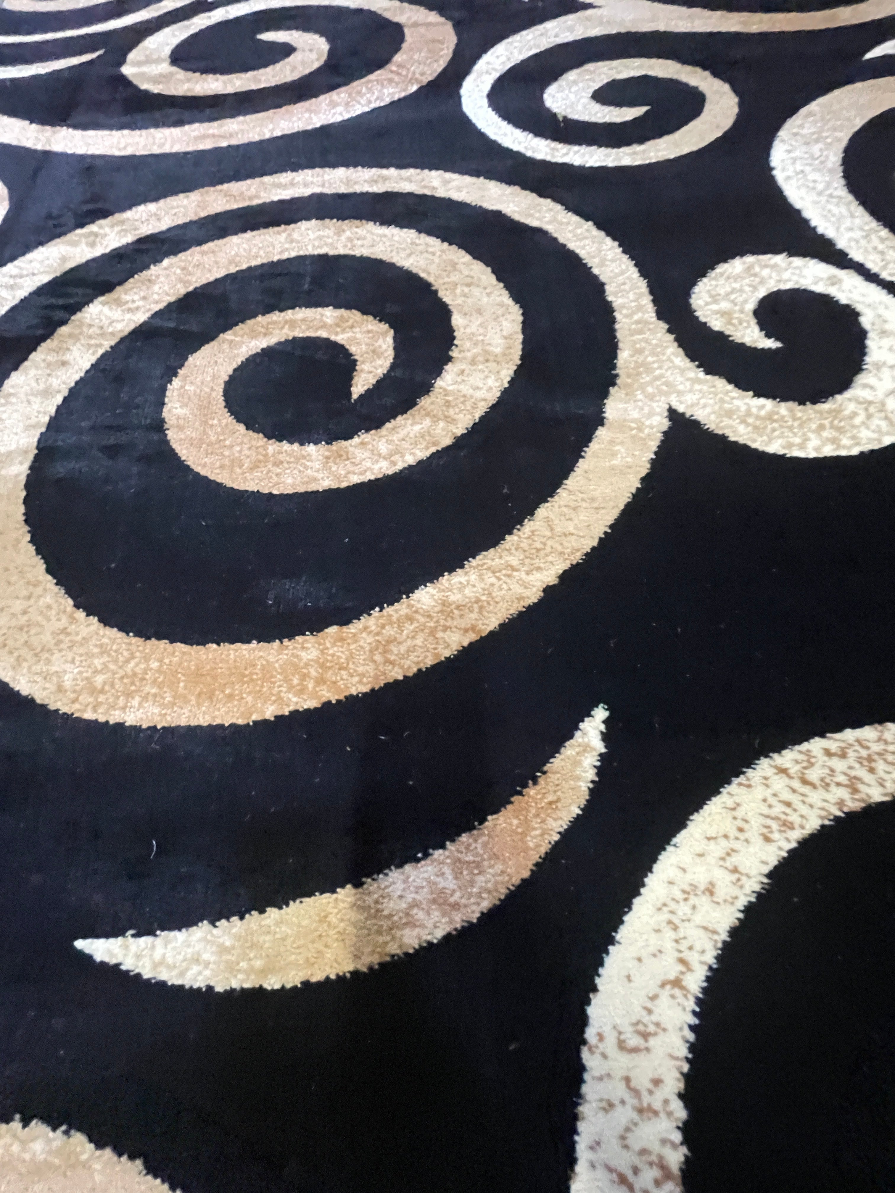 Black and Gold Swirls Festival Collection Area Rug